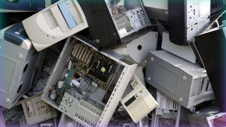 Image of old computers in a pile