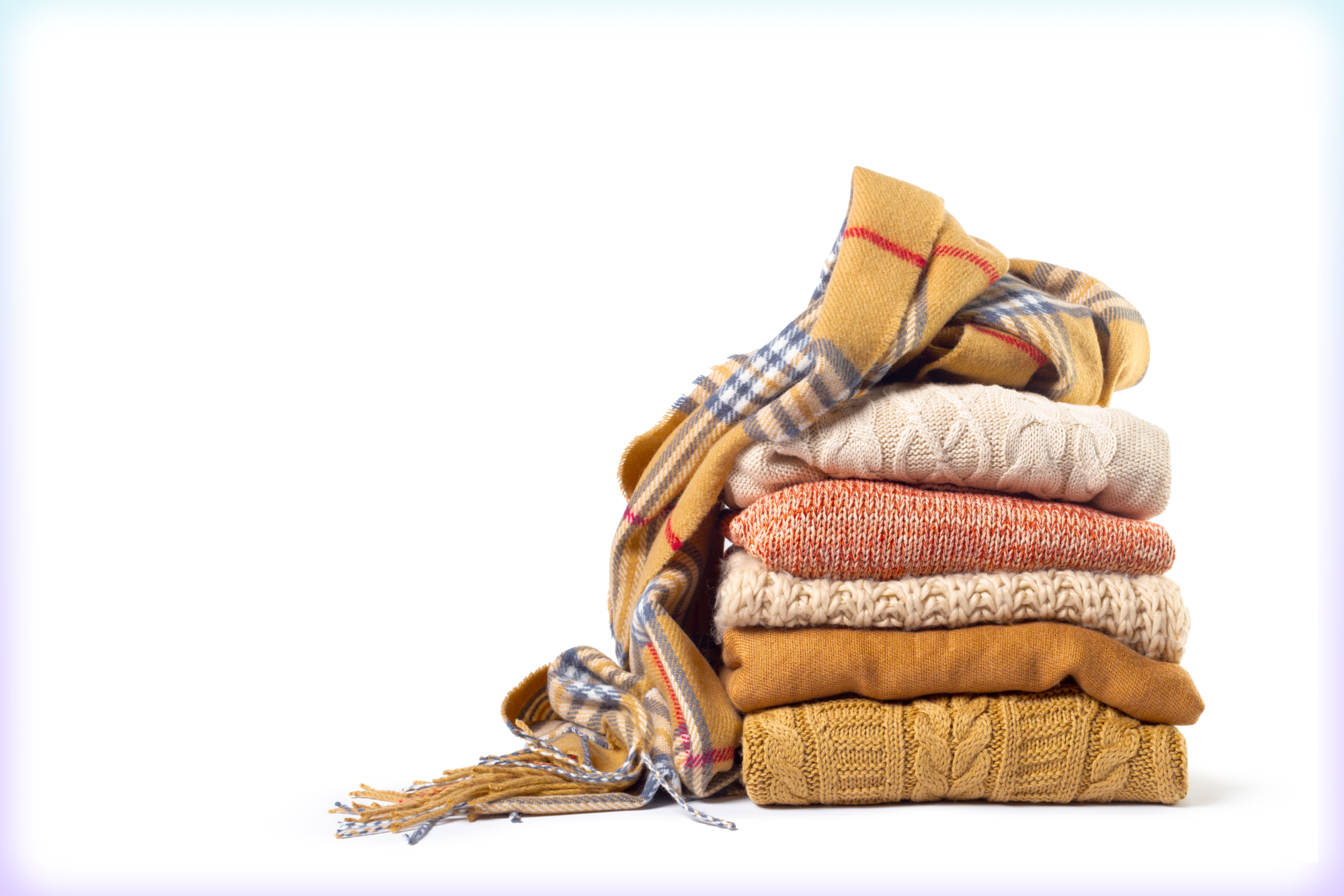 image of a stack of folded sweaters