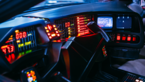 Image of a very 1980s futuristic car dashboard.