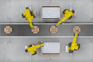 Aerial view of yellow robots on an assembly line.