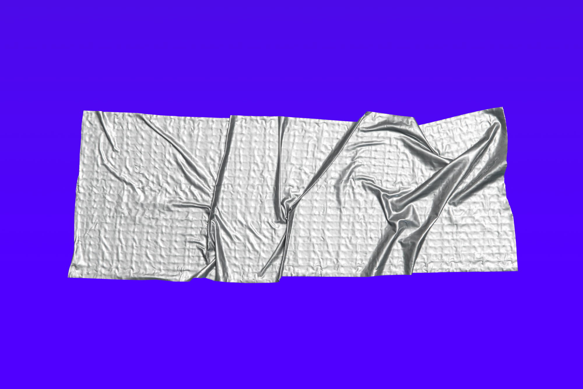 image of a piece of silver duct tape against a purple-blue background.