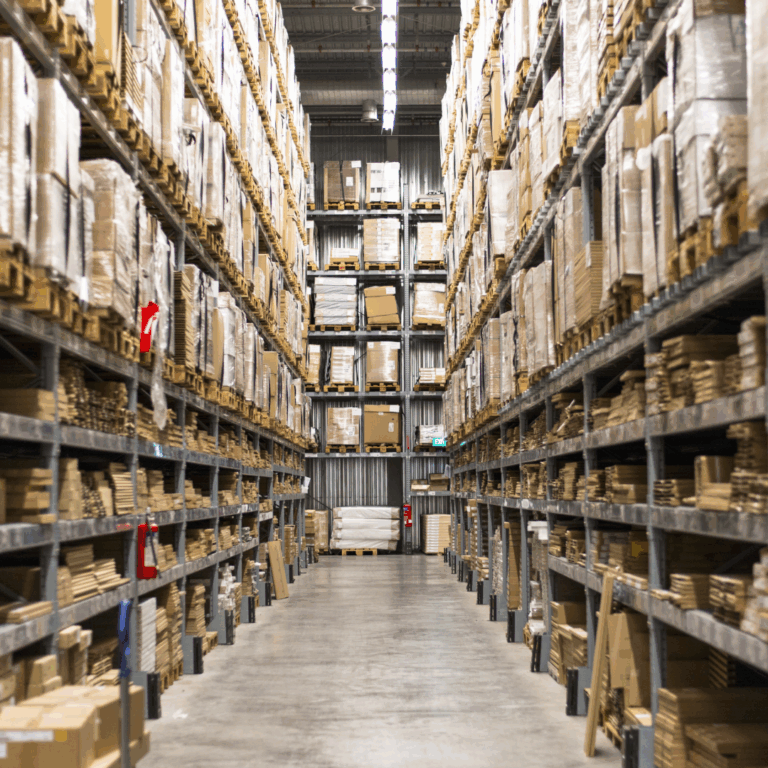 Image of several tall warehouse shelves.