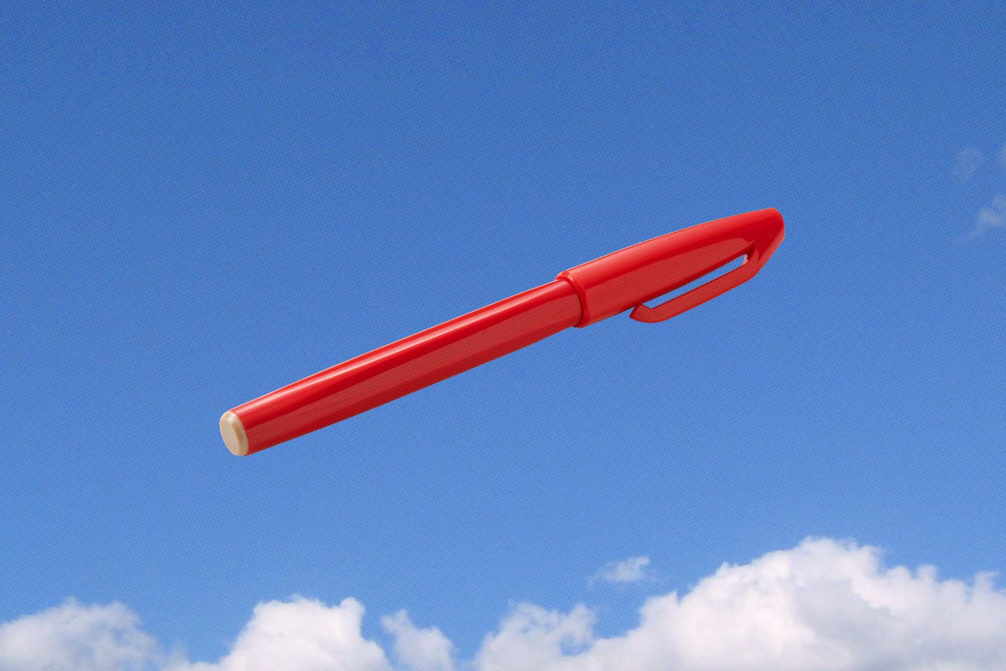 Image of a red pen floating in the air.