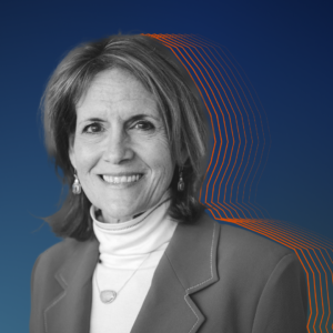 Black and white image of Traci, silhouetted by orange lines, against a dark blue background.