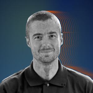 Black and white image of John silhouetted by orange lines, set against a dark blue background.