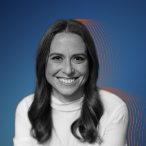 Black and white image of Kate against a dark blue background.