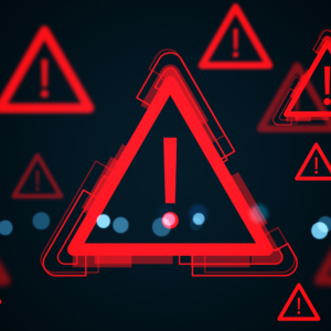 Image of red alert symbols against a black background.