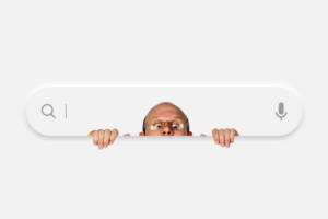Image of a search bar with a man peeking out of it.