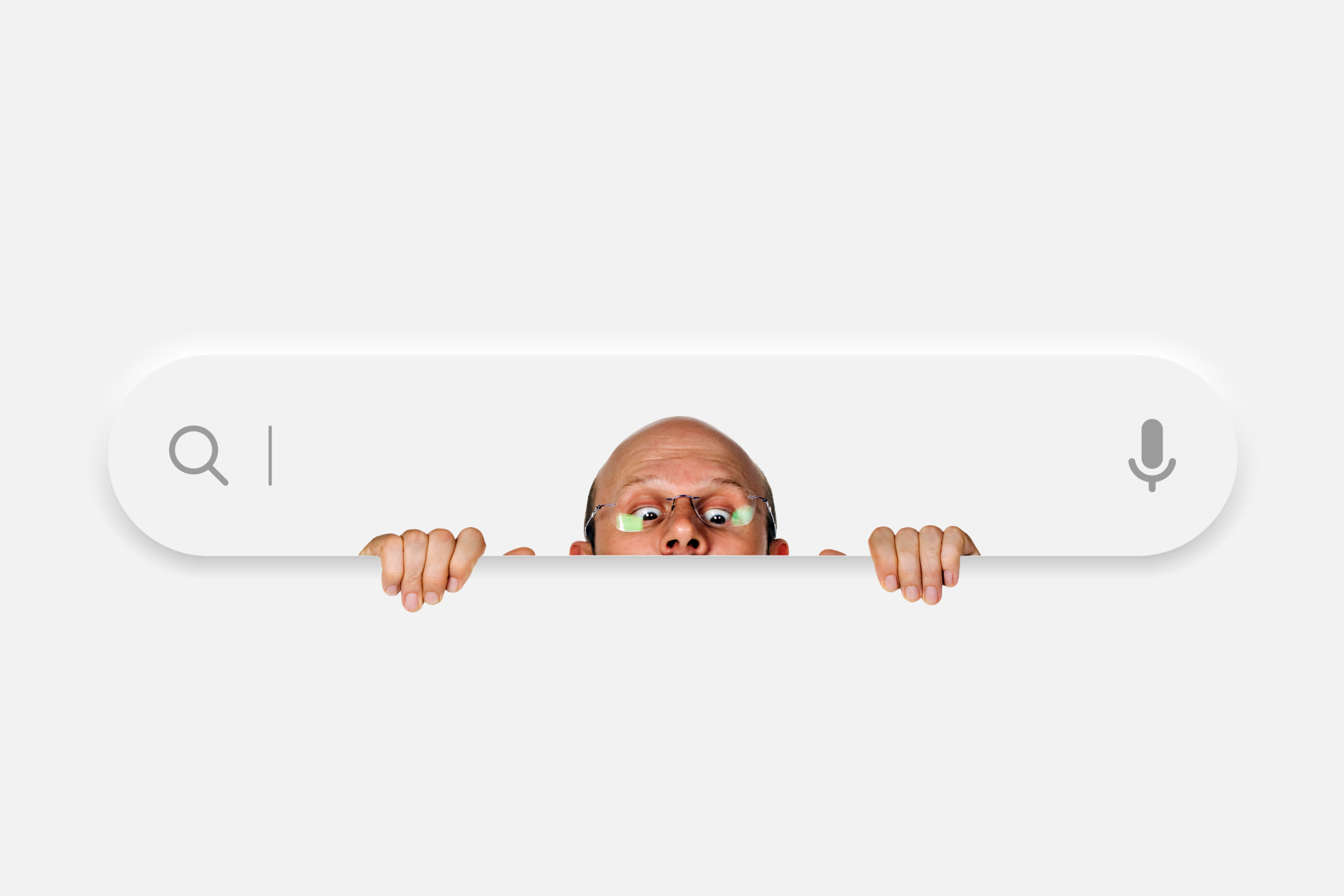 Image of a search bar with a man peeking out of it.