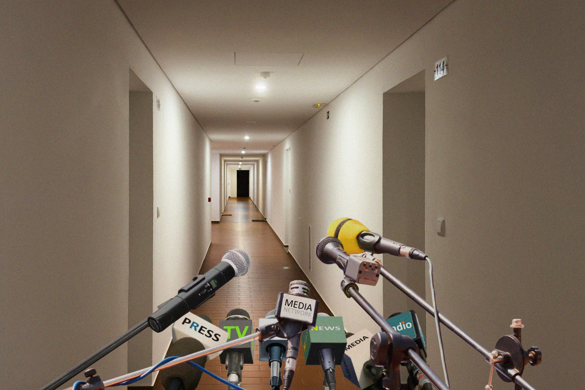 Image of a collection of microphones in an empty hallway.